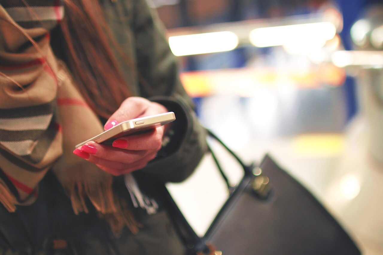 Woman texting on phone