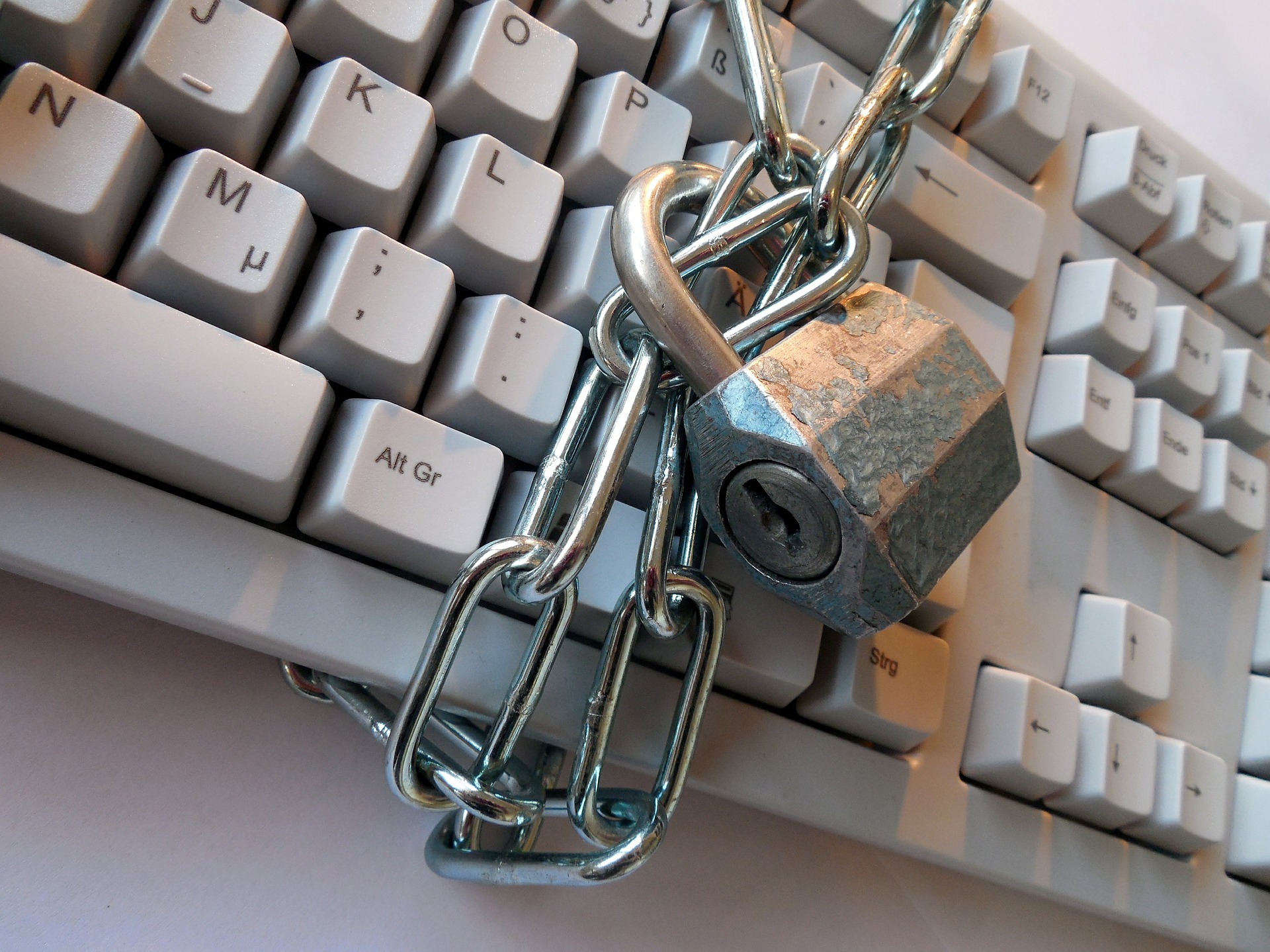 A keyboard wrapped with a chain and lock